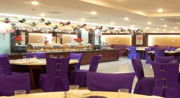 Imagen del bar/restaurante del Hotel Beijing Starmoon Hotel. Foto 3