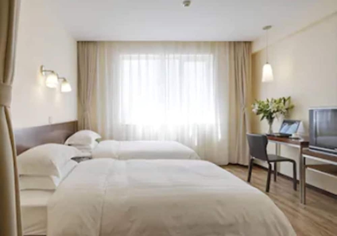 Imagen de la habitación del Hotel Beijing Sunjoy. Foto 8