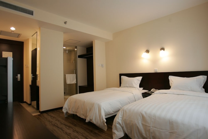 Imagen de la habitación del Hotel Beijing Sunjoy. Foto 11