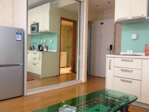 Imagen de la habitación del Hotel Beijing Tiandi Huadian Apartment Youlehui. Foto 2