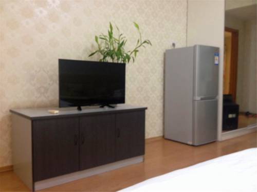 Imagen de la habitación del Hotel Beijing Tiandi Huadian Apartment Youlehui. Foto 3