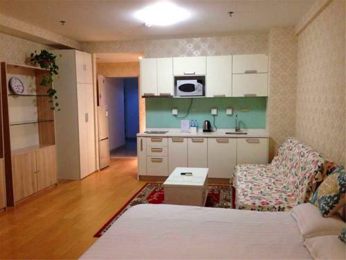 Imagen de la habitación del Hotel Beijing Tiandi Huadian Apartment Youlehui. Foto 5