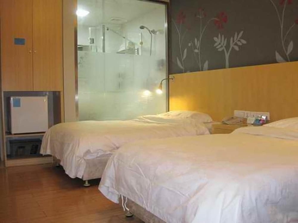 Imagen de la habitación del Hotel Beijing Tiantan Xingcheng. Foto 2