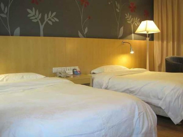 Imagen de la habitación del Hotel Beijing Tiantan Xingcheng. Foto 3