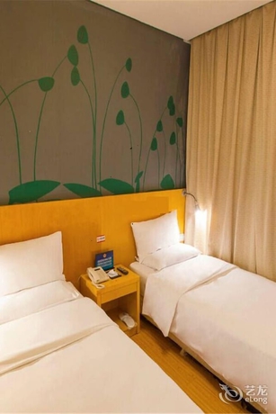 Imagen de la habitación del Hotel Beijing Tiantan Xingcheng. Foto 6