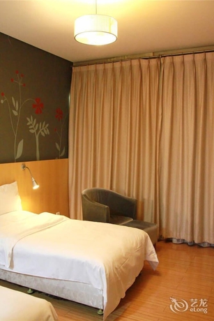 Imagen de la habitación del Hotel Beijing Tiantan Xingcheng. Foto 7