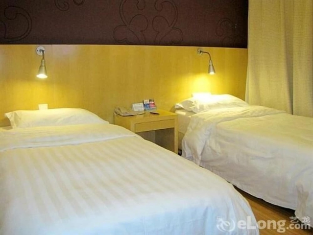 Imagen de la habitación del Hotel Beijing Tiantan Xingcheng. Foto 8