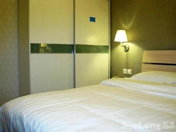 Imagen de la habitación del Hotel Beijing Tiantan Xingcheng. Foto 11