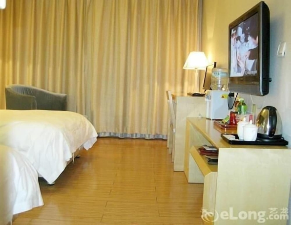 Imagen de la habitación del Hotel Beijing Tiantan Xingcheng. Foto 13