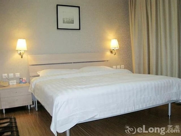 Imagen de la habitación del Hotel Beijing Tiantan Xingcheng. Foto 16