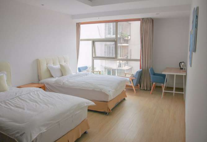 Imagen de la habitación del Hotel Beijing Together Hostel. Foto 8