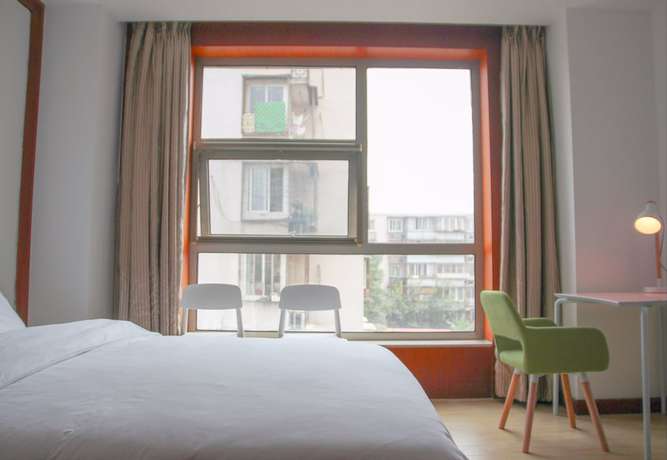 Imagen de la habitación del Hotel Beijing Together Hostel. Foto 12