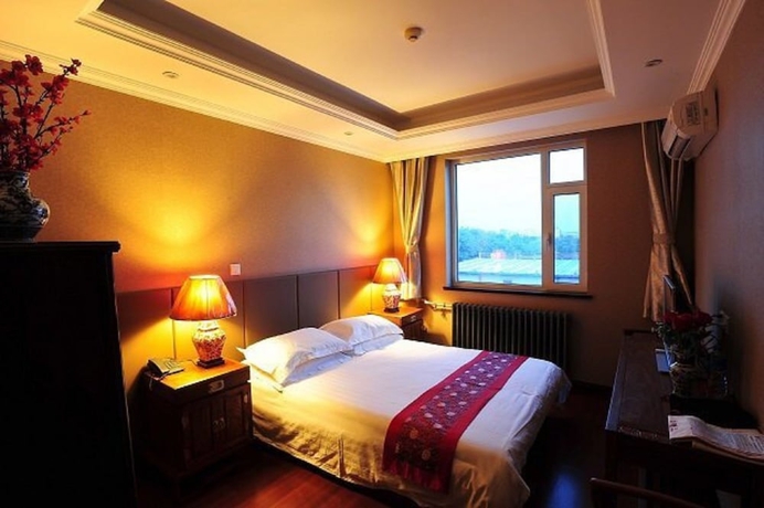 Imagen de la habitación del Hotel Beijing Traditional View Hotel. Foto 2