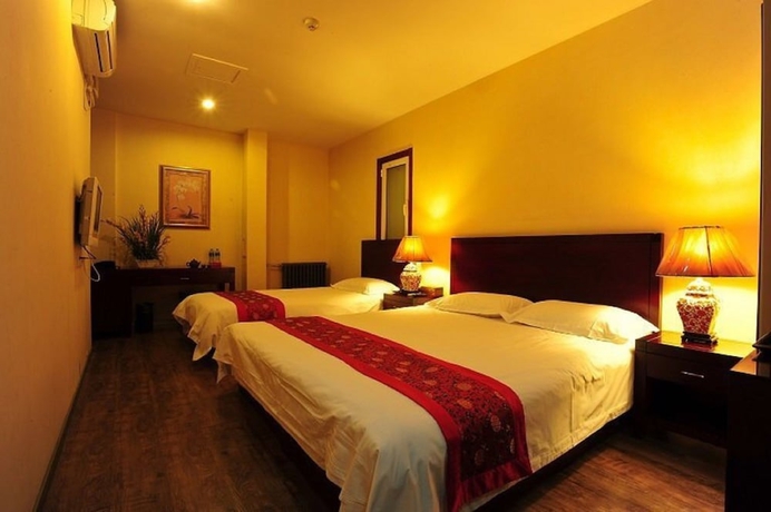 Imagen de la habitación del Hotel Beijing Traditional View Hotel. Foto 12