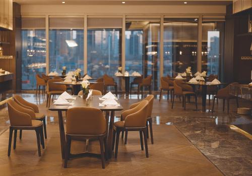 Imagen del bar/restaurante del Hotel Beijing Xiamenair Jianianhua. Foto 4