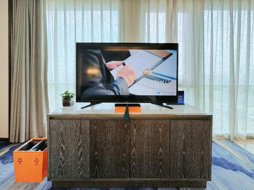 Imagen de la habitación del Hotel Beijing Xiamenair Jianianhua. Foto 6