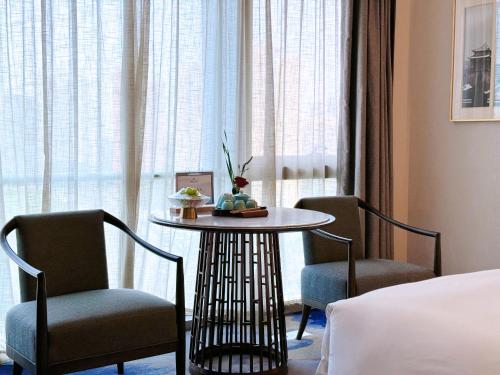 Imagen de la habitación del Hotel Beijing Xiamenair Jianianhua. Foto 7