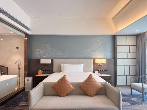 Imagen de la habitación del Hotel Beijing Xiamenair Jianianhua. Foto 11