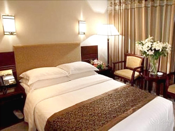 Imagen de la habitación del Hotel Beijing Xiaoxiang. Foto 11