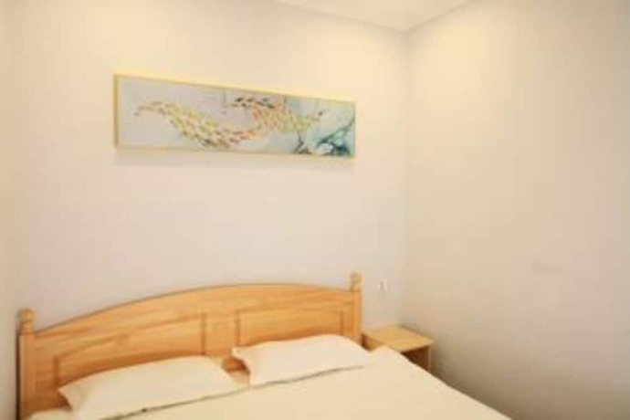 Imagen de la habitación del Hotel Beijing Xingshe. Foto 3