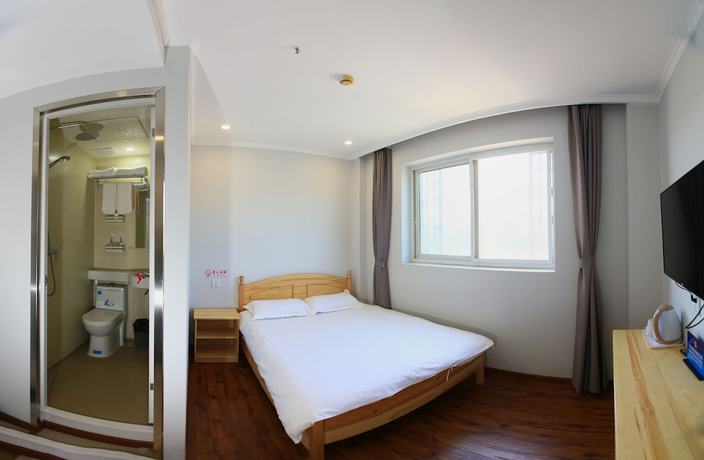 Imagen de la habitación del Hotel Beijing Xingshe. Foto 4