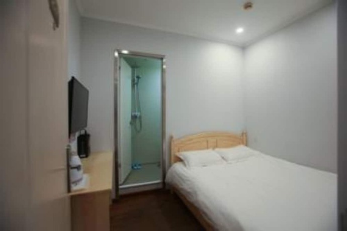 Imagen de la habitación del Hotel Beijing Xingshe. Foto 5