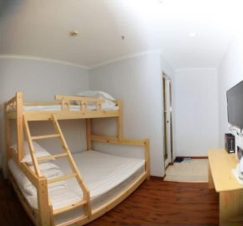 Imagen de la habitación del Hotel Beijing Xingshe. Foto 7