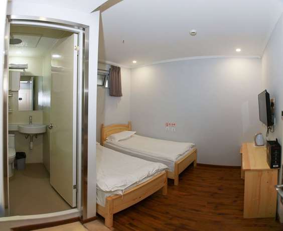 Imagen de la habitación del Hotel Beijing Xingshe. Foto 8