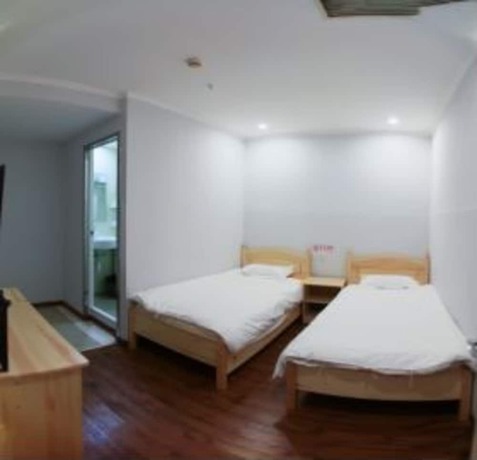 Imagen de la habitación del Hotel Beijing Xingshe. Foto 9