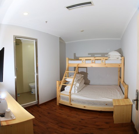 Imagen de la habitación del Hotel Beijing Xingshe. Foto 10