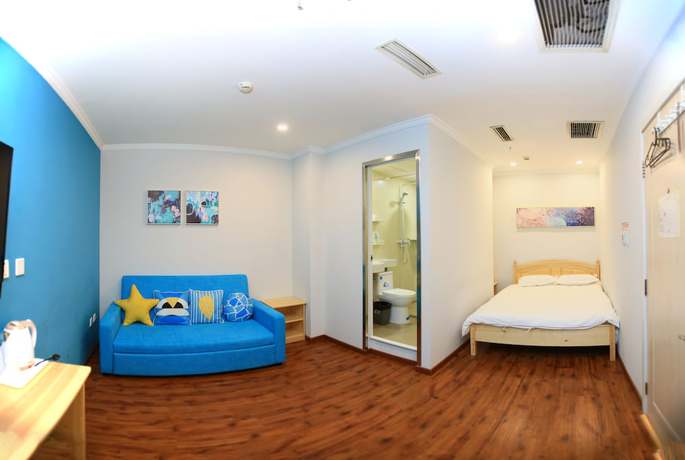 Imagen de la habitación del Hotel Beijing Xingshe. Foto 11