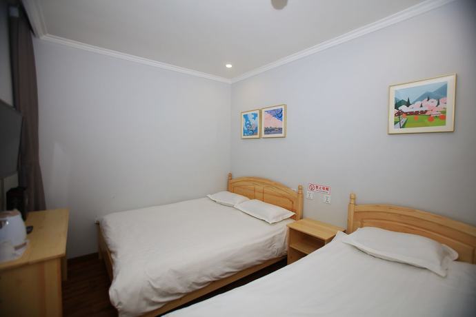 Imagen de la habitación del Hotel Beijing Xingshe. Foto 12