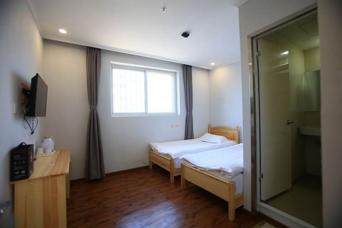 Imagen de la habitación del Hotel Beijing Xingshe. Foto 15