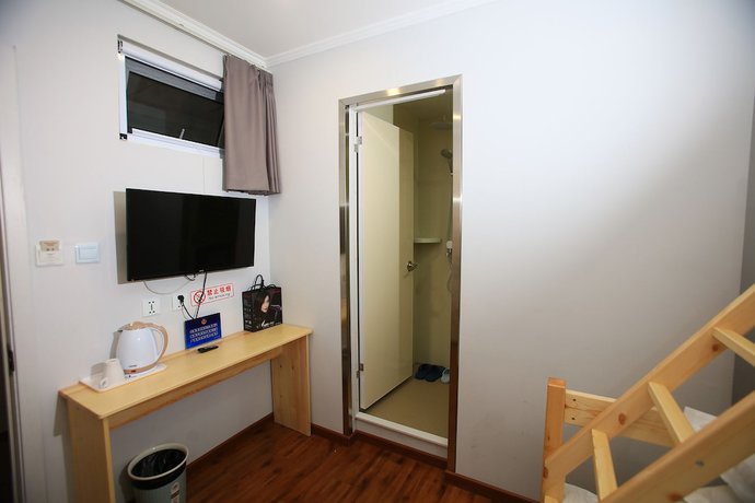 Imagen de la habitación del Hotel Beijing Xingshe. Foto 16
