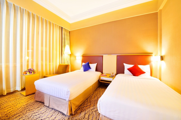 Imagen de la habitación del Hotel Beijing Xinqiao. Foto 5