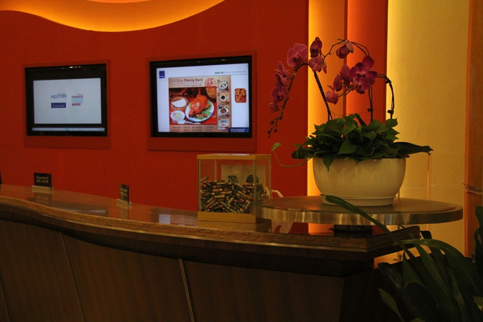 Imagen de los interiores del Hotel Beijing Xinqiao. Foto 12