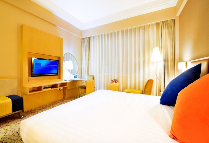 Imagen de la habitación del Hotel Beijing Xinqiao. Foto 6