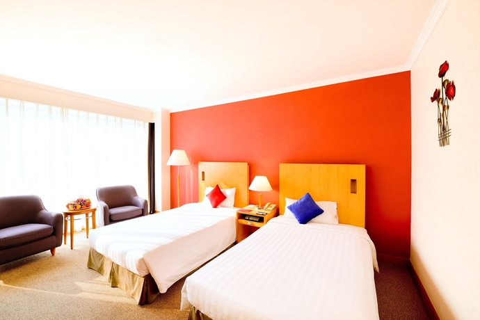 Imagen de la habitación del Hotel Beijing Xinqiao. Foto 7