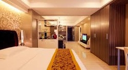 Imagen de la habitación del Hotel Beijing Xinxiang Yayuan Apartment. Foto 3