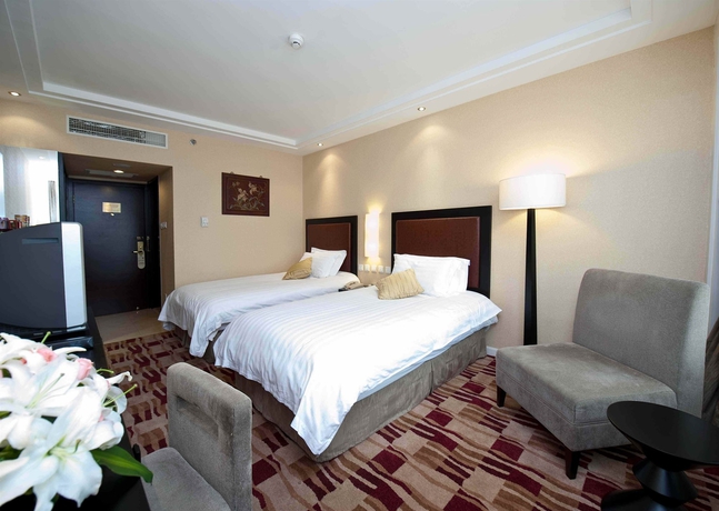 Imagen de la habitación del Hotel Beijing Yanshan. Foto 3