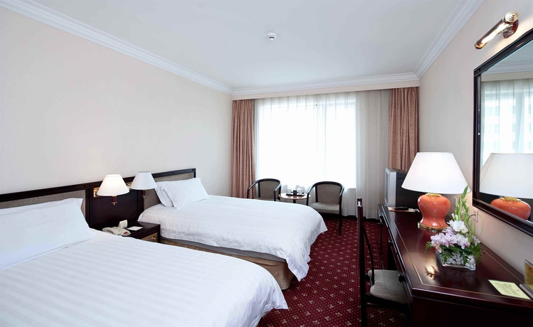 Imagen de la habitación del Hotel Beijing Yanshan. Foto 4