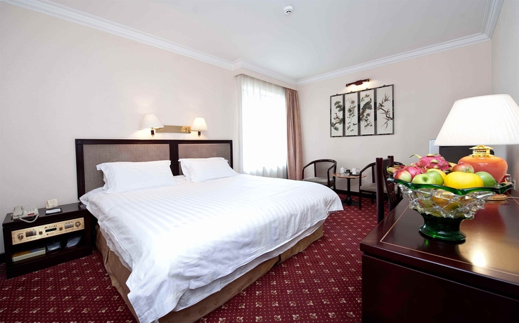 Imagen de la habitación del Hotel Beijing Yanshan. Foto 6