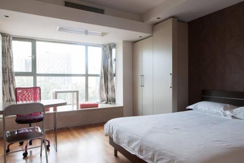 Imagen general del Hotel Beijing Yasiming Haisheng Service Apartment. Foto 6