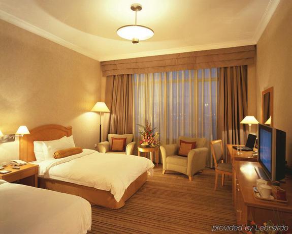 Imagen de la habitación del Hotel Beijing Yifa Hotel (North Building). Foto 2