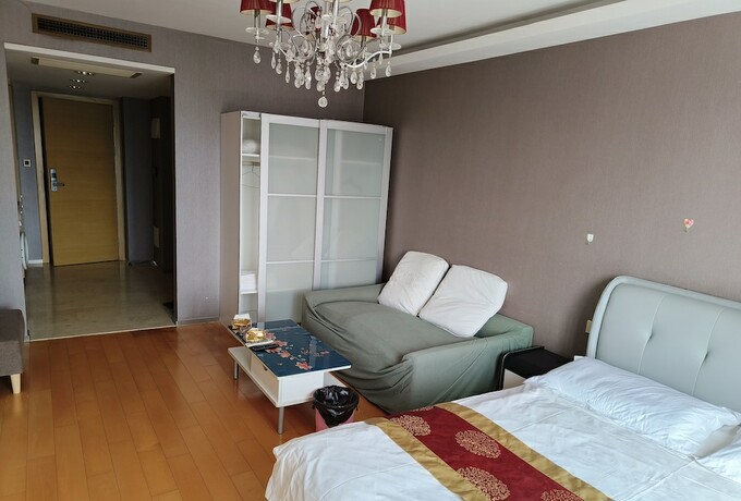 Imagen general del Hotel Beijing Yilejia Apartment. Foto 8