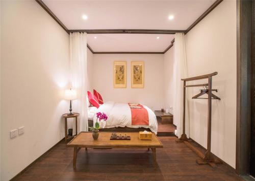 Imagen de la habitación del Hotel Beijing Youlan. Foto 7