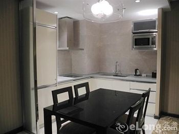 Imagen de la habitación del Hotel Beijing Yulong International. Foto 6