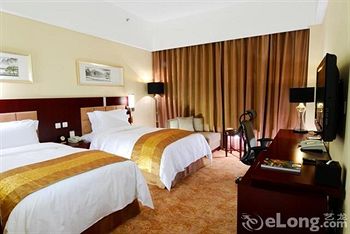 Imagen de la habitación del Hotel Beijing Yulong International. Foto 8