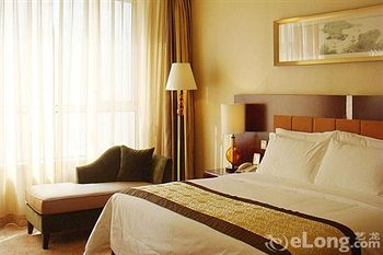 Imagen de la habitación del Hotel Beijing Yulong International. Foto 9