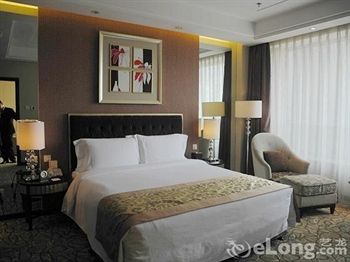Imagen de la habitación del Hotel Beijing Yulong International. Foto 10